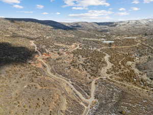 View of mountain backdrop with rural landscape
