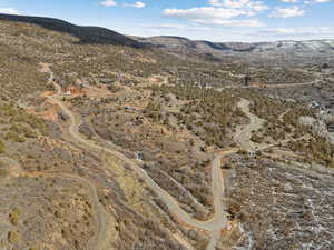 View of mountain backdrop featuring rural landscape