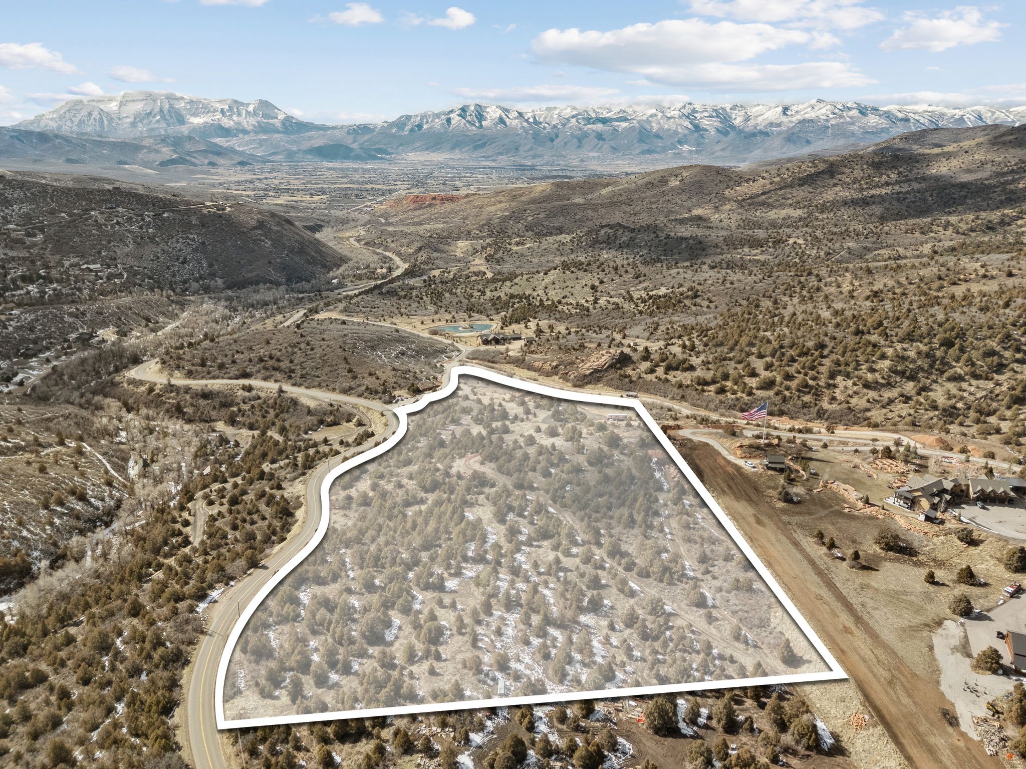 View of rural area with mountains and property boundaries highlighted