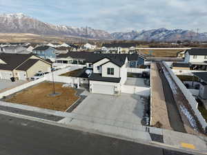 Aerial perspective of suburban area featuring mountains