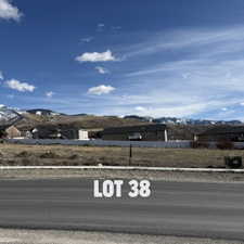 View of front of home featuring a mountain view