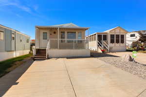 Manufactured / mobile home featuring covered porch