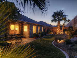 Back of property with a patio area