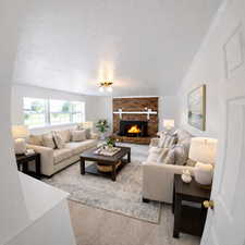 Carpeted living area featuring a fireplace and a textured ceiling. AI Decor.