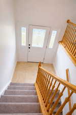 Stairway featuring healthy amount of natural light