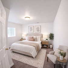 Carpeted bedroom with baseboards