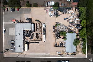 Aerial view of property's location with property boundaries highlighted and an industrial area