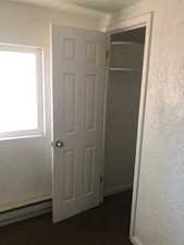 Closet with baseboard heating