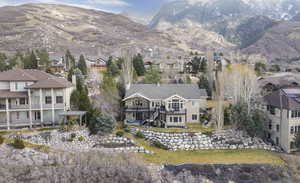 View of mountain background featuring nearby suburban area