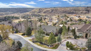 Aerial view of residential area with a mountainous background