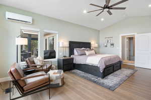 Bedroom with vaulted ceiling, wood finished floors, ceiling fan, and recessed lighting