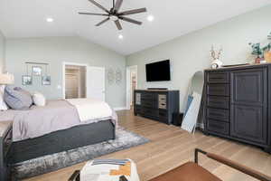 Bedroom with light wood-type flooring, ceiling fan, and recessed lighting