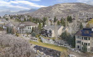View of mountain background featuring nearby suburban area