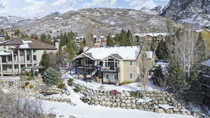 Snowy aerial view with a mountain view