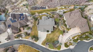 Aerial overview of property's location featuring nearby suburban area