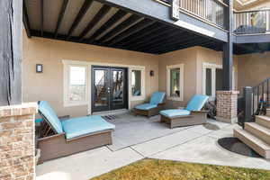 Patio / terrace featuring a patio and french doors