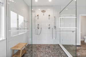 Full bath featuring a stall shower and recessed lighting