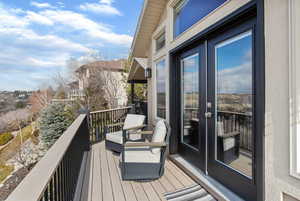 Balcony featuring french doors