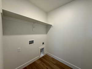 Laundry area featuring light wood finished floors, electric dryer hookup, and washer hookup