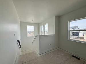 Stairway featuring baseboards