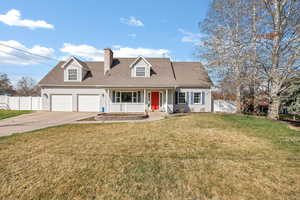 Cape cod-style house with a porch, a chimney, concrete driveway, roof with shingles, and an attached garage
