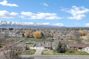 Aerial view of residential area with a mountain backdrop