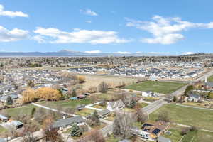 Aerial view of residential area with mountains