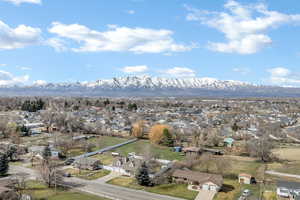 Aerial view of residential area with a mountain backdrop