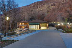 View of front of property featuring concrete driveway and a mountain view