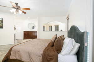Bedroom with carpet flooring, ornamental molding, ceiling fan, and recessed lighting