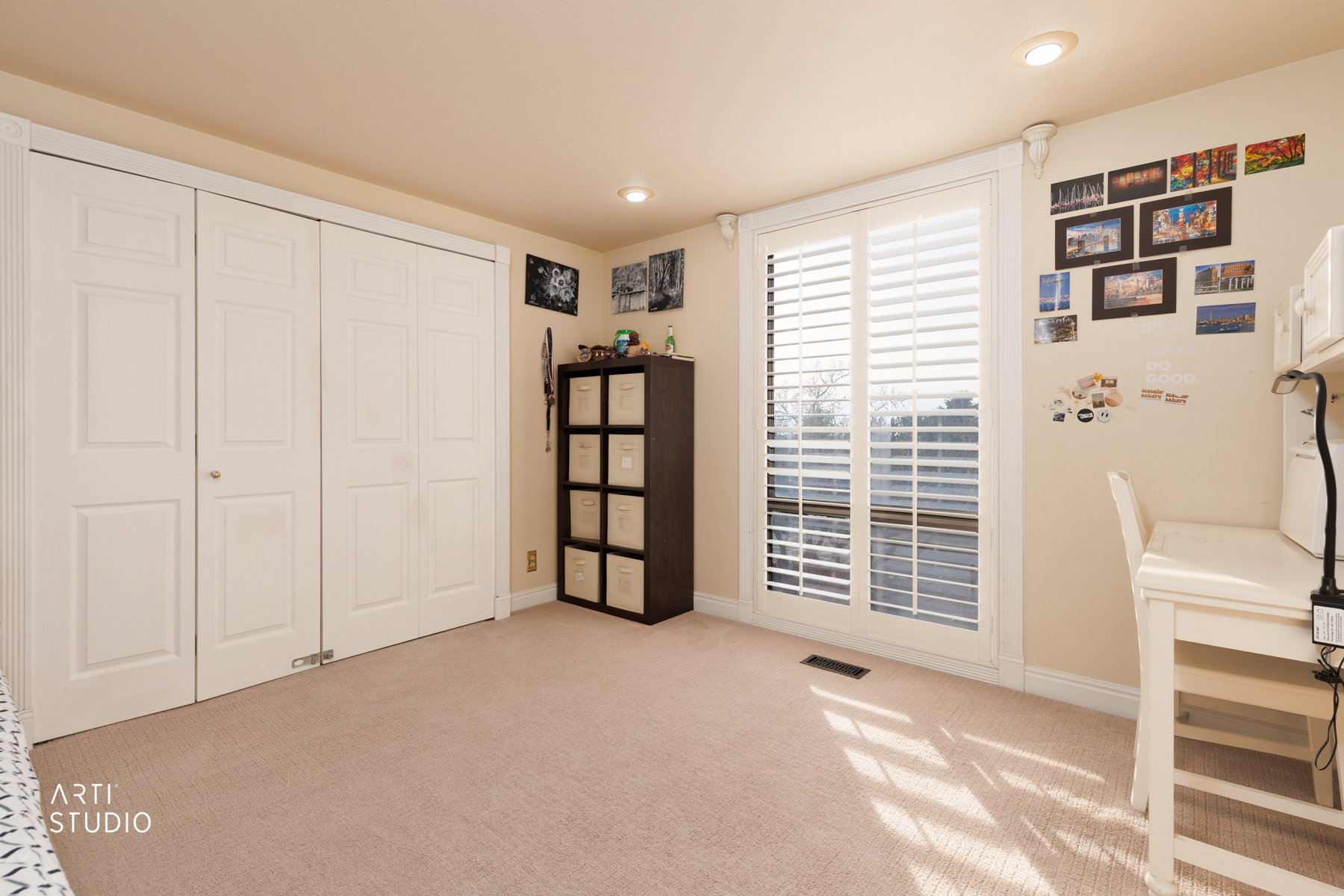Office space featuring light carpet and recessed lighting
