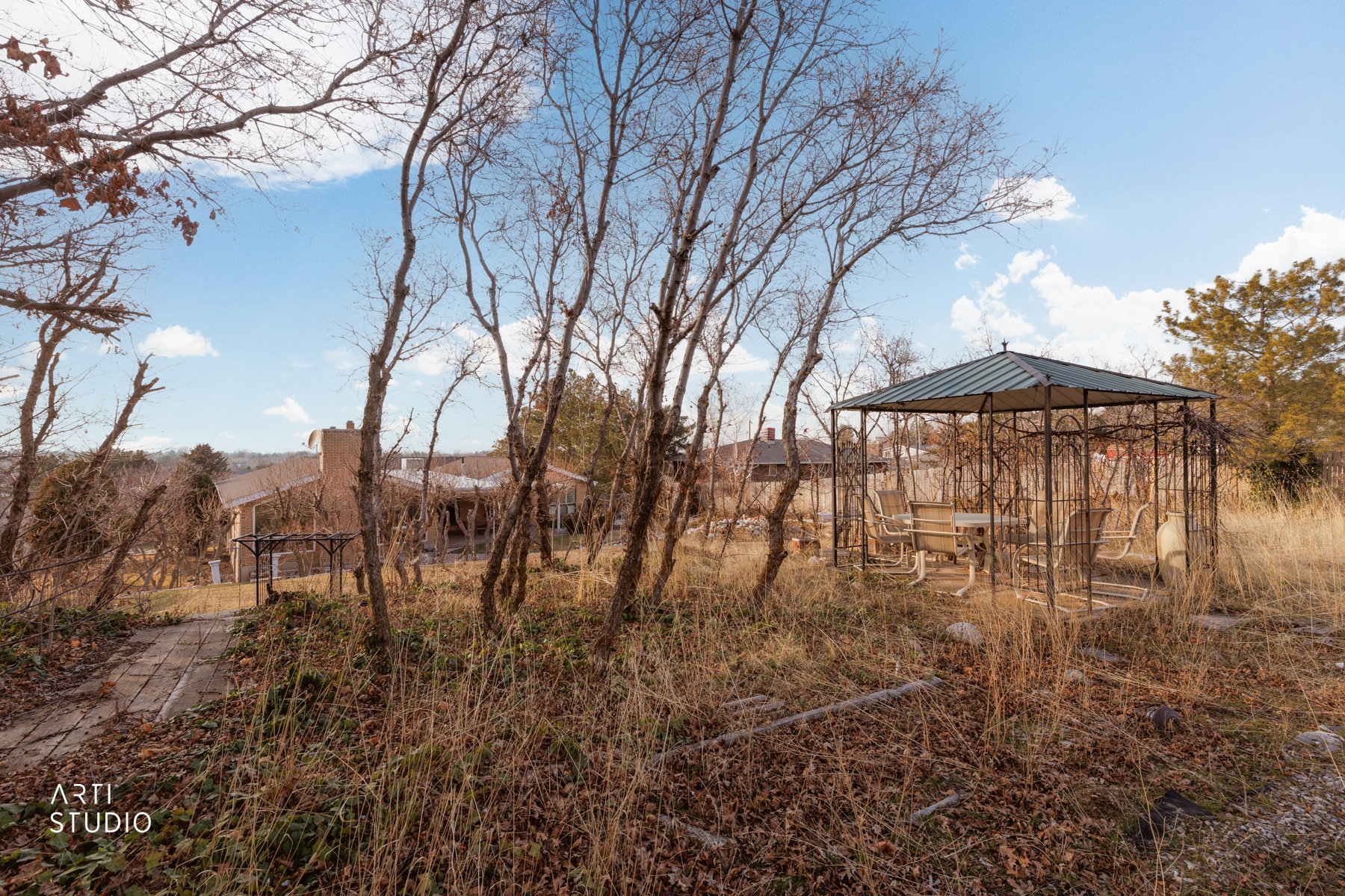 View of yard featuring a gazebo and a patio