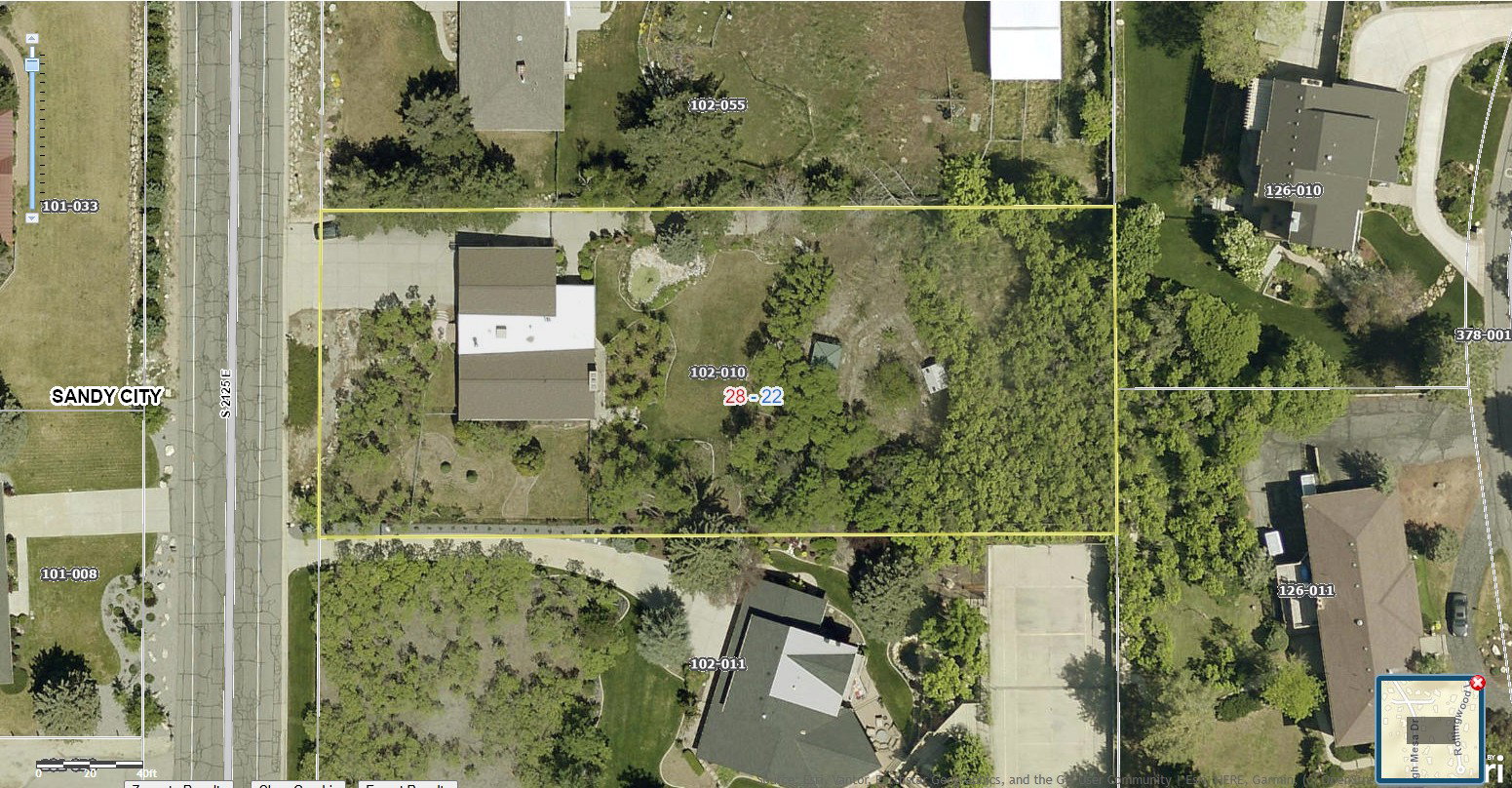 Aerial map of property and surrounding area with property boundaries highlighted