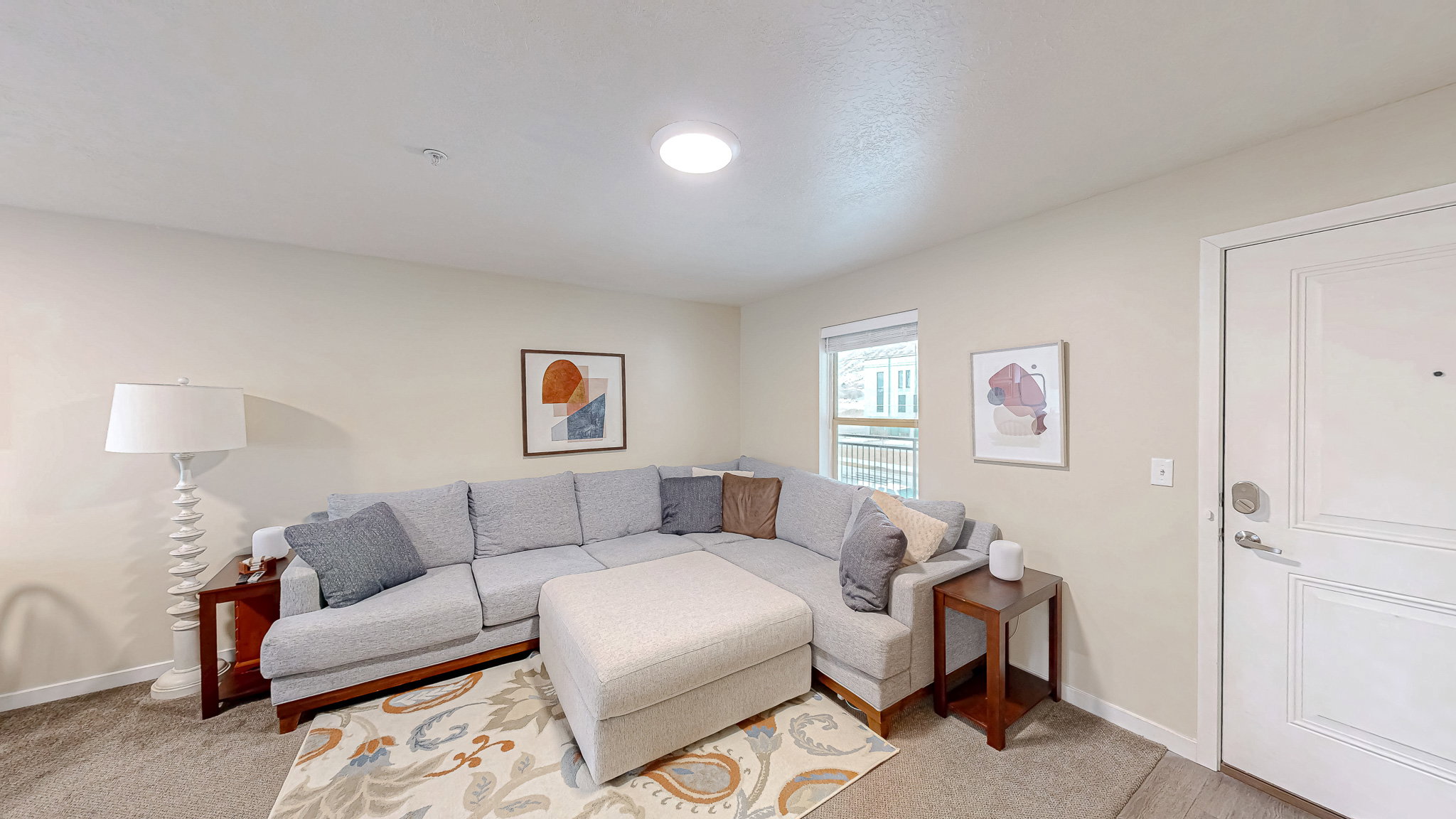 Living room with light colored carpet