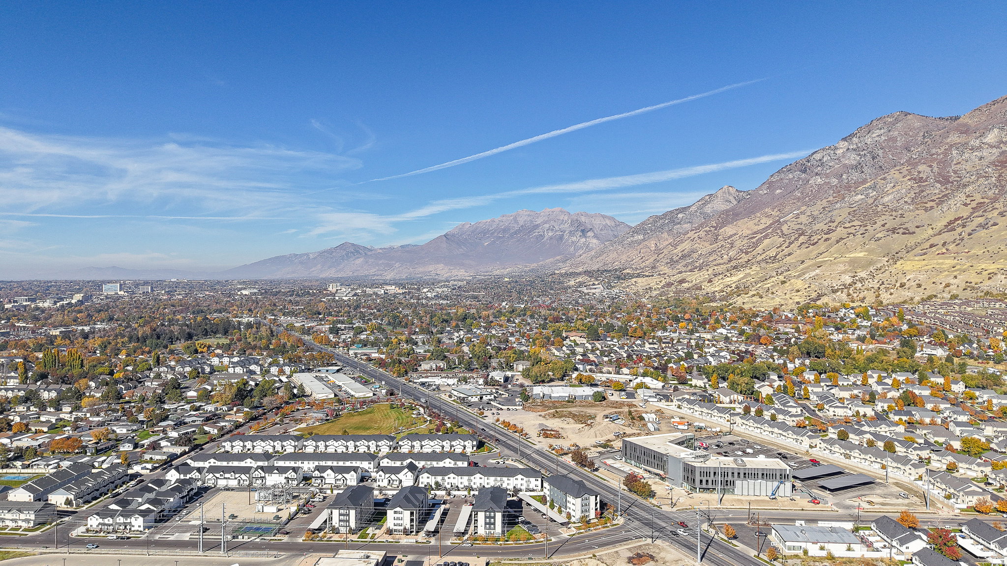 Aerial view of residential area with mountains