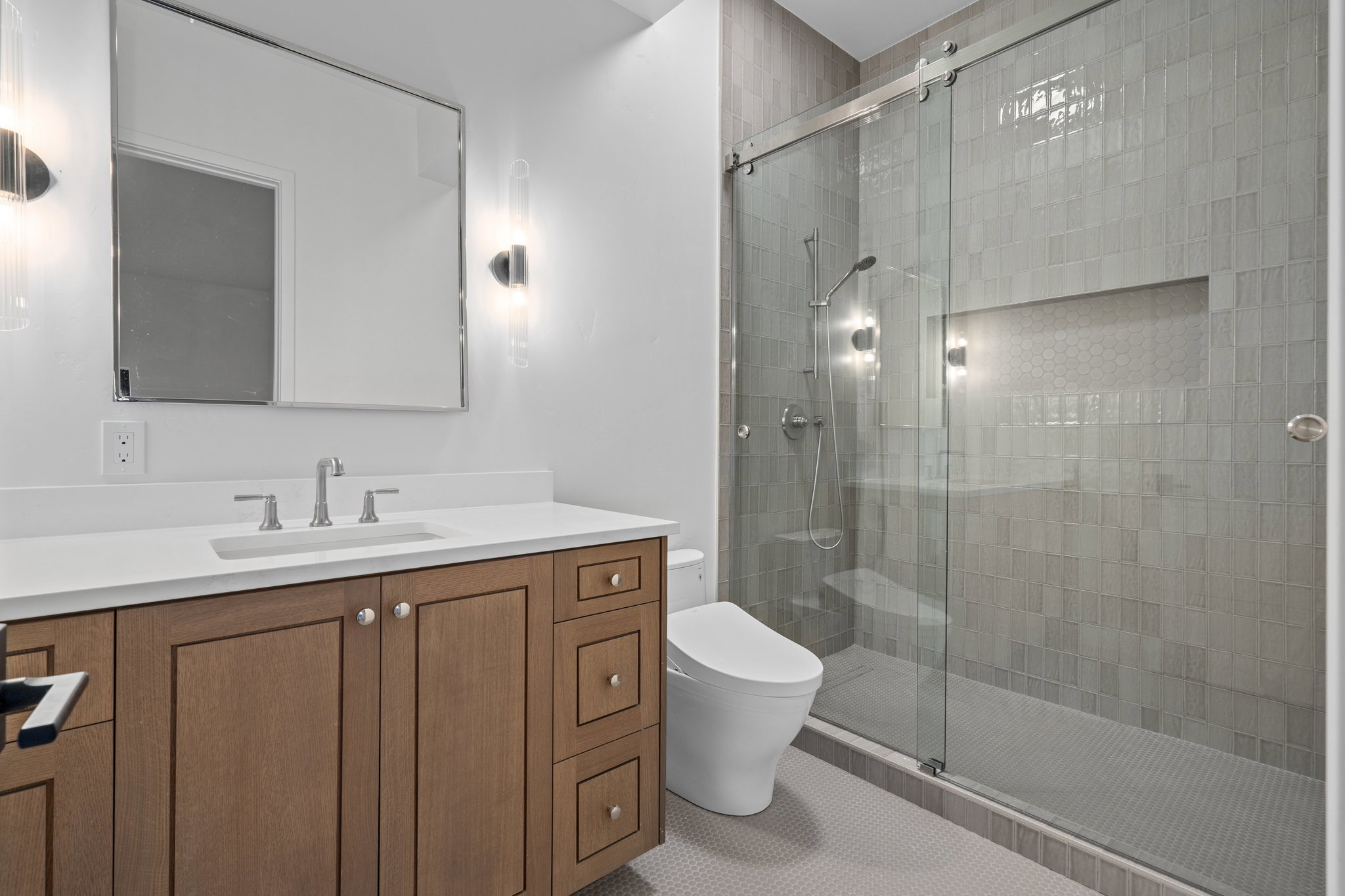 ADU Bathroom featuring vanity and a shower stall