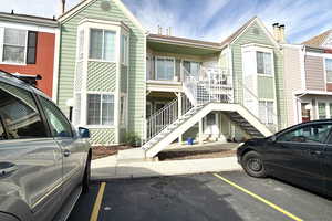 View of front facade with uncovered parking