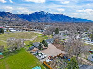 Aerial view of residential area featuring a mountainous background