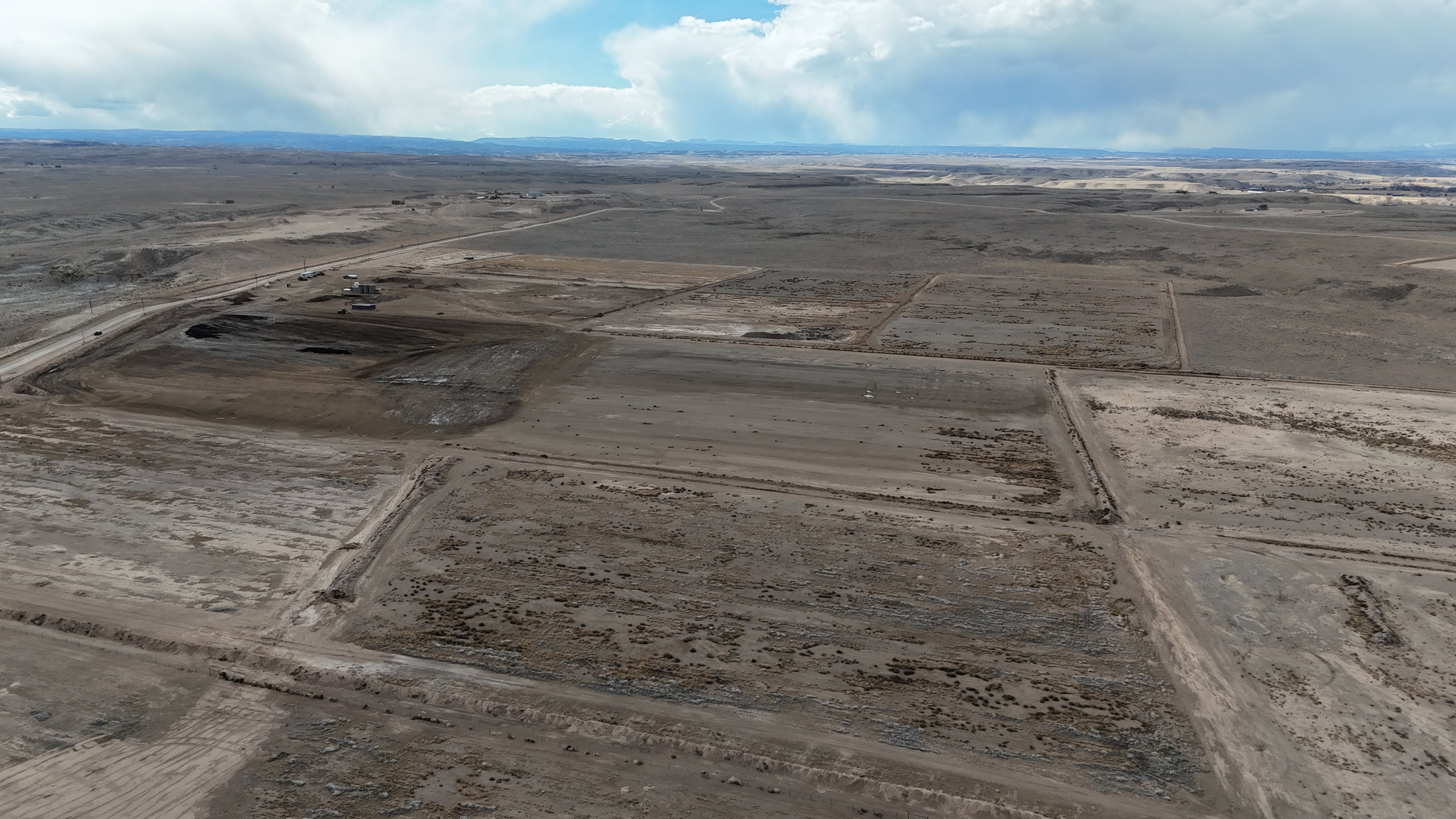 Aerial view of sparsely populated area featuring a desert landscape
