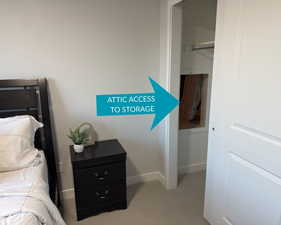 Guest bedroom with attic access to storage