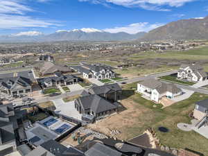 Aerial view of residential area with a mountain backdrop