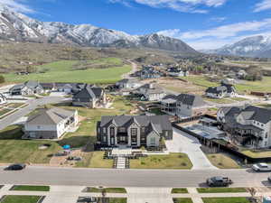 Aerial view of residential area featuring mountains