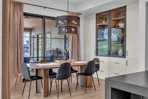 Dining room with light wood finished floors