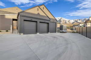 Garage featuring a mountain view