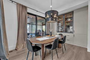 Dining room with light wood-style floors