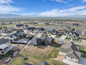 Aerial view of residential area featuring mountains
