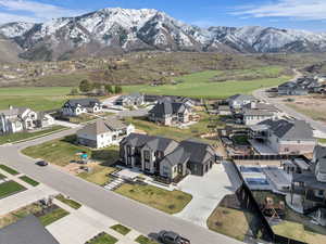 Aerial view of residential area featuring mountains
