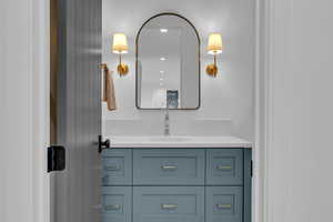 Bathroom featuring vanity and recessed lighting