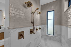 Bathroom featuring walk in shower