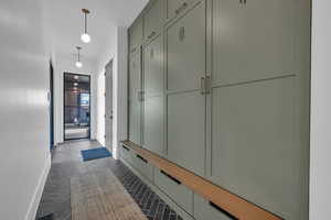 Mudroom featuring baseboards